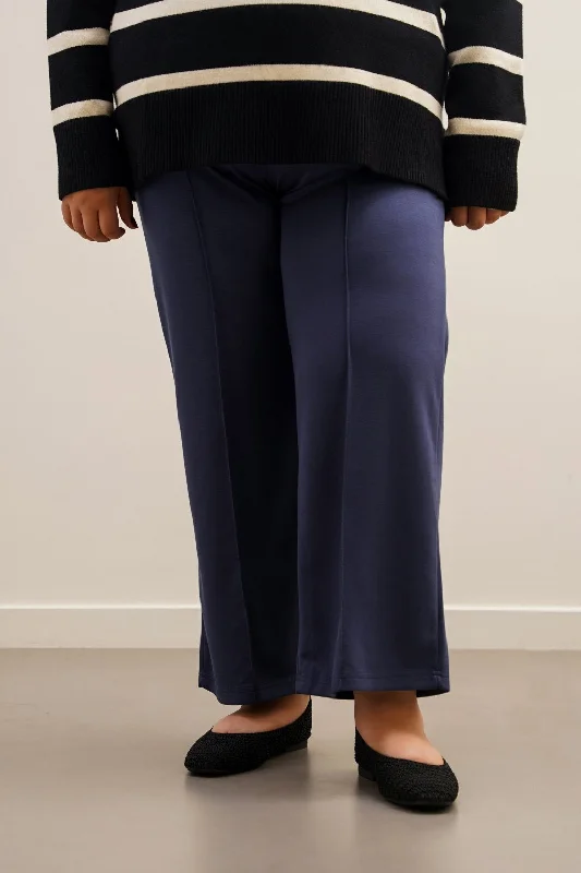 CURVE PLEATED TROUSERS